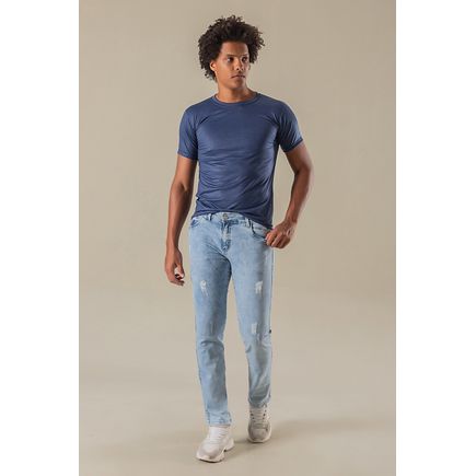 Calça jeans skinny com puídios delavê